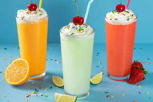 Strawberry, Lime, and Orange Flavored Italian Soda with Fresh Fruit and Infused Simple Syrup